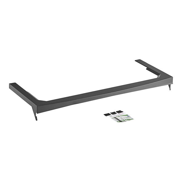 A Manitowoc Ice top rail trim for an ice bin with a metal frame.