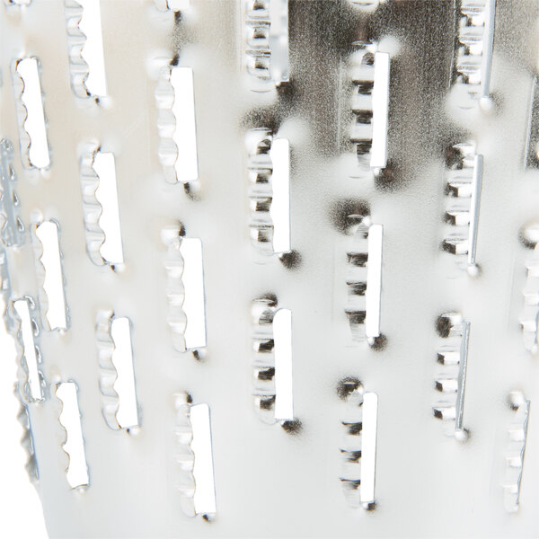 A close up of a metal Vollrath King Kutter cone with shredder holes.