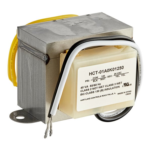 A close-up of a Vulcan 120V transformer with yellow and white wires inside a metal box.