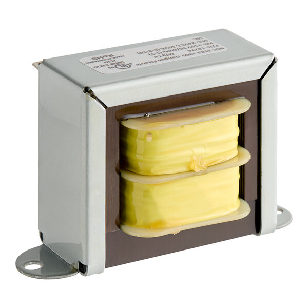 A metal-encased electrical transformer with yellow coil windings.