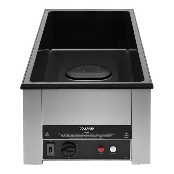 A stainless steel countertop appliance with a black basin, control knob, power switch, and indicator lights on the front panel.