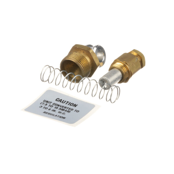 A close-up of a Middleby Marshall metal and brass connector.