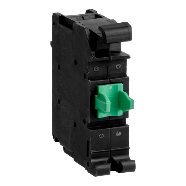 A black rectangular electrical switch with a prominent green toggle in the center.