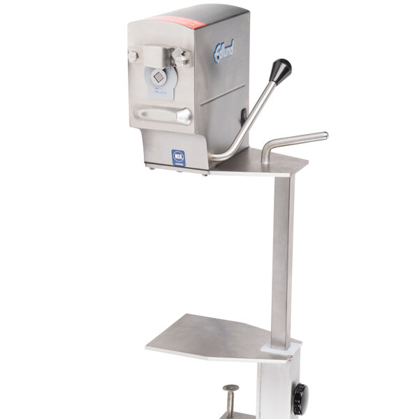 An Edlund 270C Two-Speed Electric Can Opener on a stand.