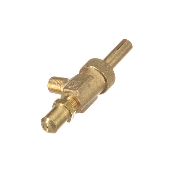 A close-up of a brass valve with a gold handle.