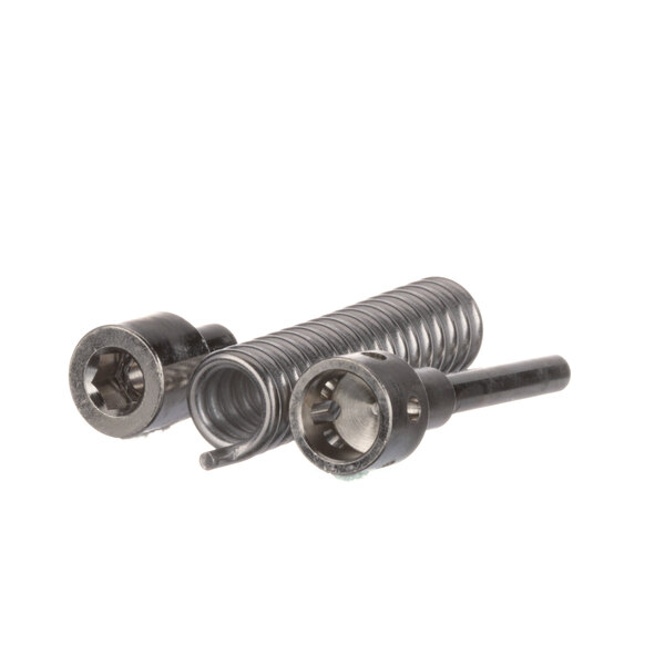 A close-up of a metal spring with two metal screws.