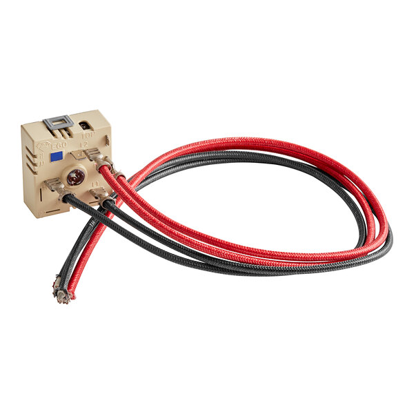 A small black and red wires connected to a box.