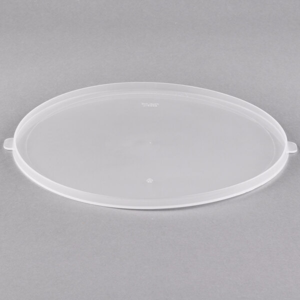 A clear plastic Fineline bowl lid on a gray background.