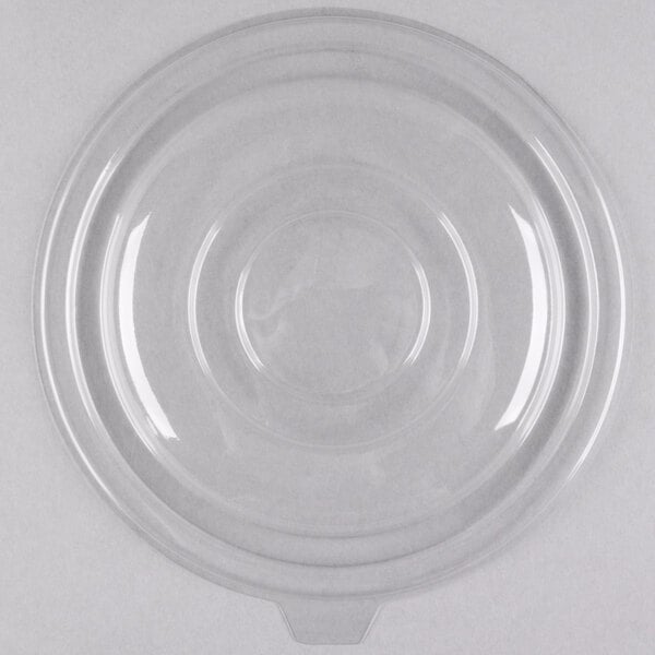 A clear plastic lid with a circular rim.