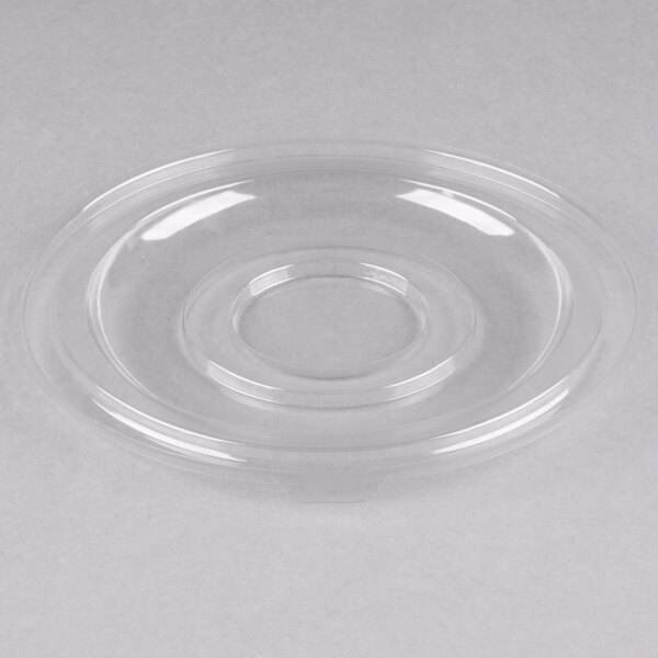 A clear plastic lid with a circular rim.