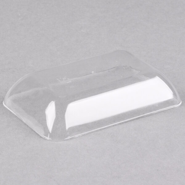 A clear plastic Fineline rectangular tiny tray.
