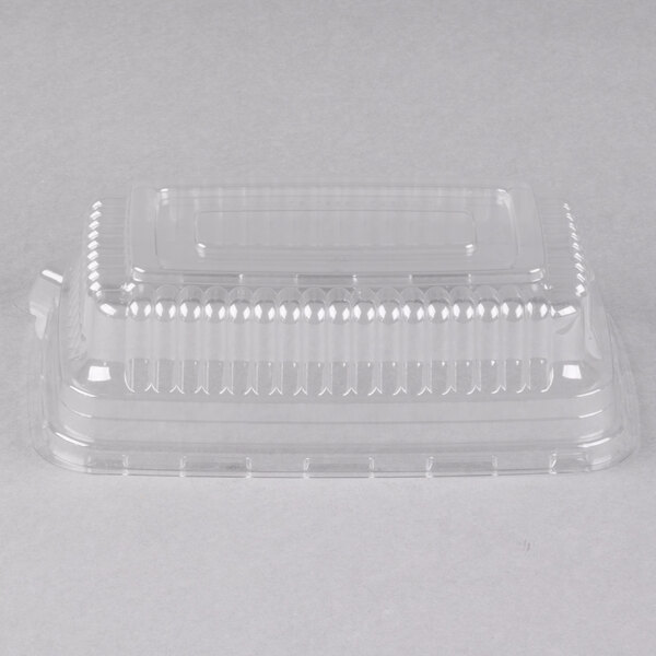 A clear plastic Fineline snack tray dome lid.