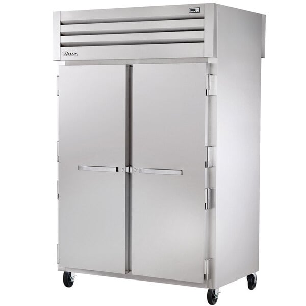 A True stainless steel reach-in refrigerator with a solid front and glass back.