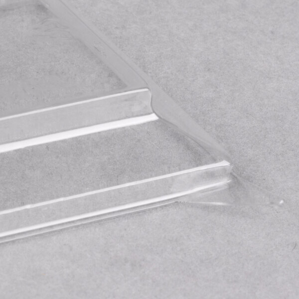 A clear plastic dome lid on a clear plastic Fineline Tiny Tumbler.