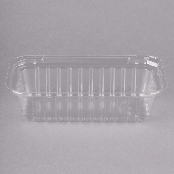 A Durable Packaging clear plastic container with a lid.