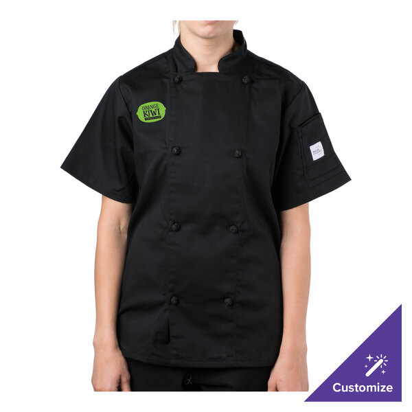 A person wearing a Mercer Culinary black chef coat.