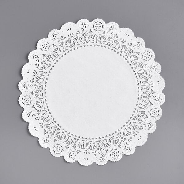 a white paper doily with a white border