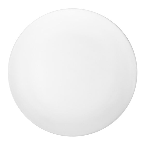 A round, white stoneware dinner plate with a matte finish.