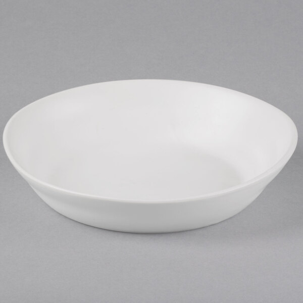 A 10 Strawberry Street white stoneware bowl on a gray background.