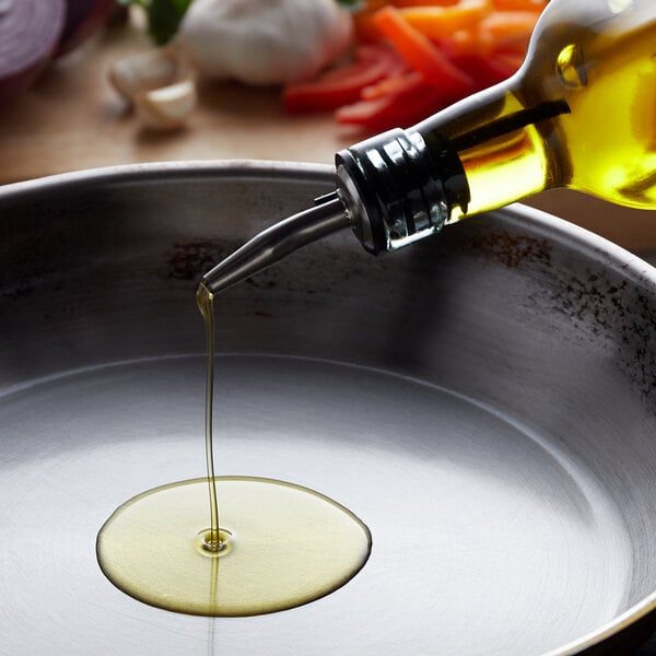  oil being poured into pan
