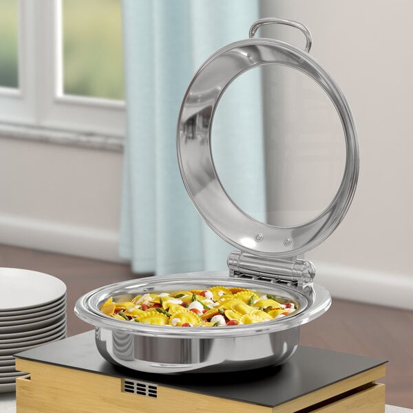 An Acopa Voyage stainless steel chafer with pasta, cheese, and vegetables inside.