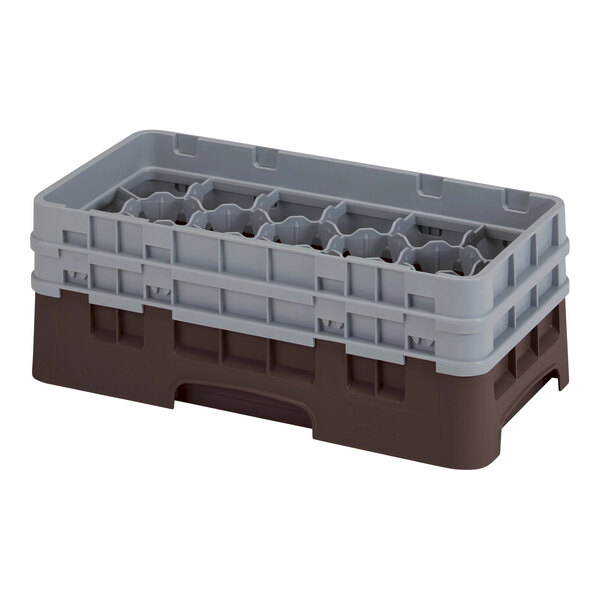 A brown and grey plastic Cambro half size glass rack with 17 compartments.