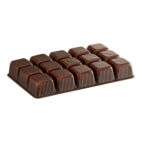 A close up of a brown 15-cavity candy tray.