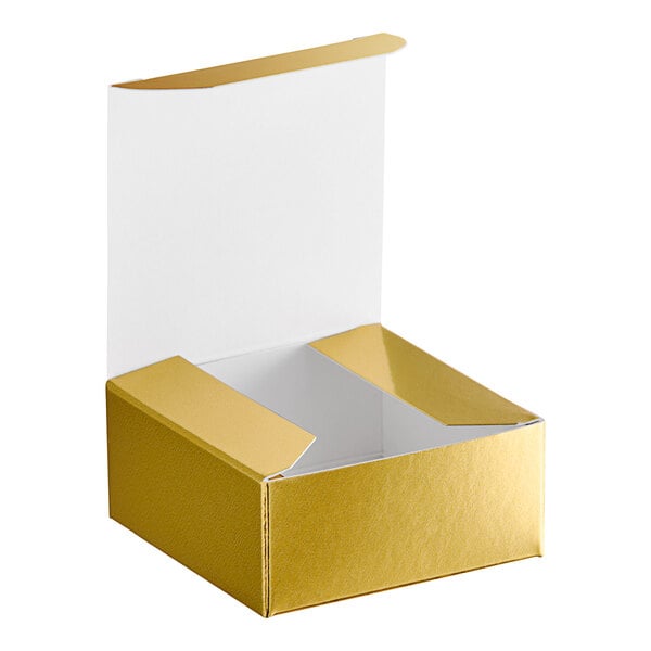 A gold box with a white lid.