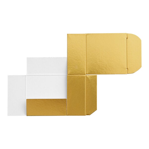 A gold and white rectangular candy box with white paper inside.