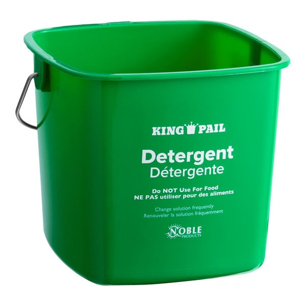 A green plastic cleaning pail with a metal handle and printed labeling for detergent use.