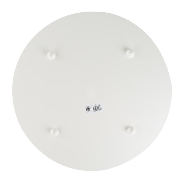 An American Metalcraft round melamine serving board with a faux olive wood surface and pegs.