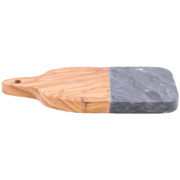 An American Metalcraft olive wood serving board with a black marble top.