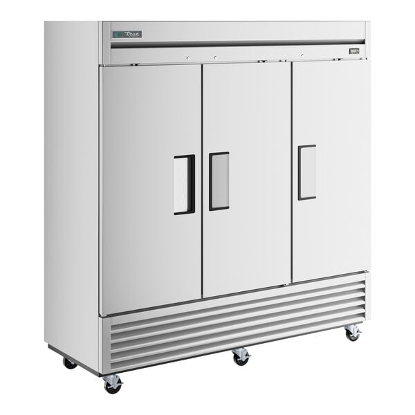 A stainless steel True reach-in refrigerator with three doors.