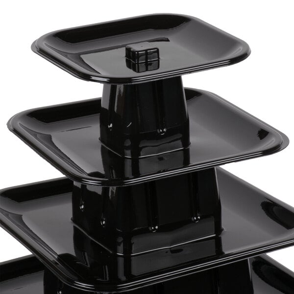A black plastic Matfer Bourgeat macaron display stand with nine tiers.
