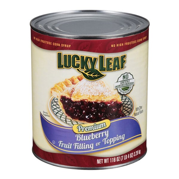 A can of Lucky Leaf Premium Non-GMO Blueberry Pie Filling on a table.