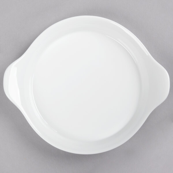 A white Libbey porcelain dish with handles.