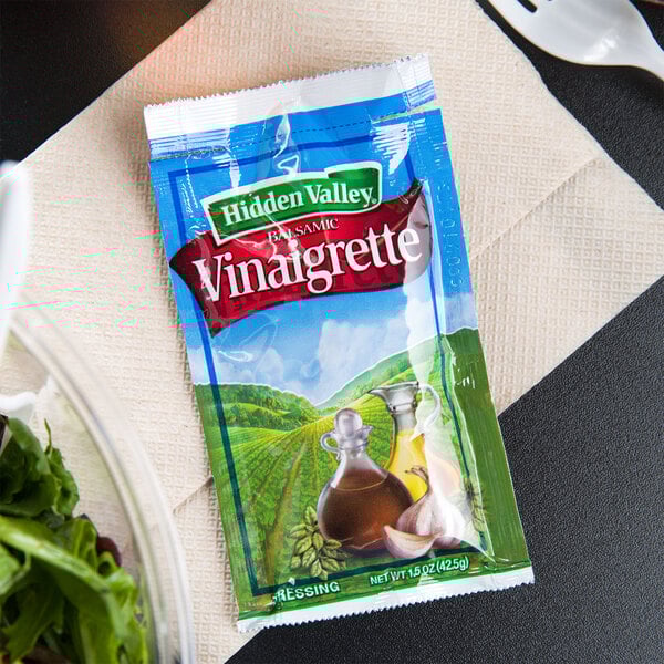 A Hidden Valley Balsamic Vinaigrette packet on a napkin.