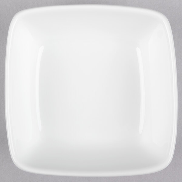 A white square Libbey Chef's Selection bowl on a gray surface.
