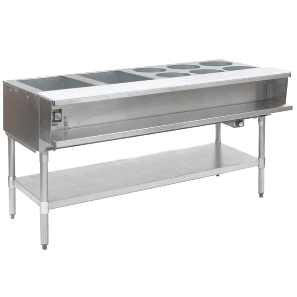 An Eagle Group stainless steel liquid propane steam table with eight sealed wells.
