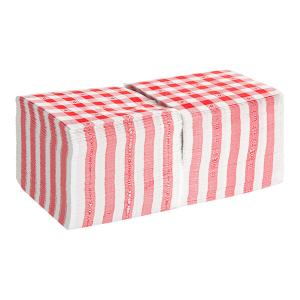 A stack of red and white paper napkins with a gingham pattern.