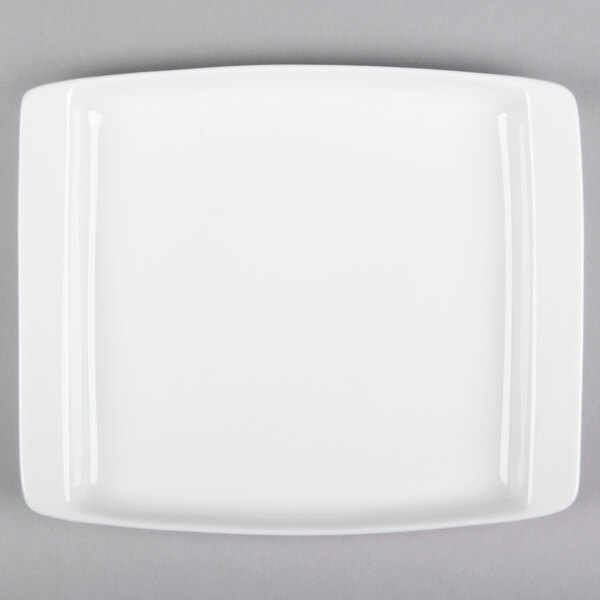 A white rectangular Libbey Chef's Selection porcelain platter with black lines on the edges.
