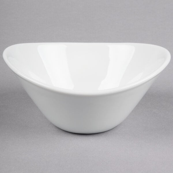 A white Libbey Infinity bowl on a gray surface.