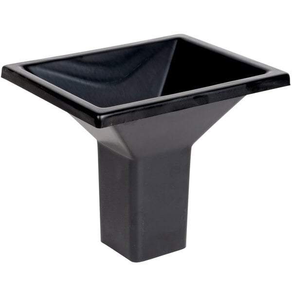 A Manitowoc stainless steel ice bagger funnel on a counter.