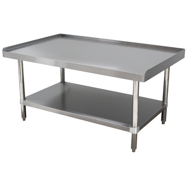 An Advance Tabco stainless steel equipment stand with a shelf.