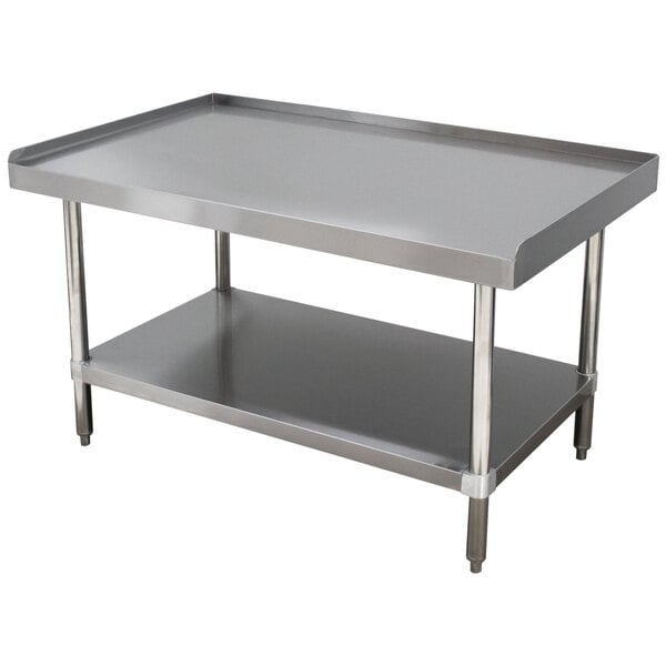 A stainless steel Advance Tabco equipment stand with two shelves.