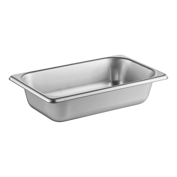 A Vollrath stainless steel hotel pan on a silver tray.