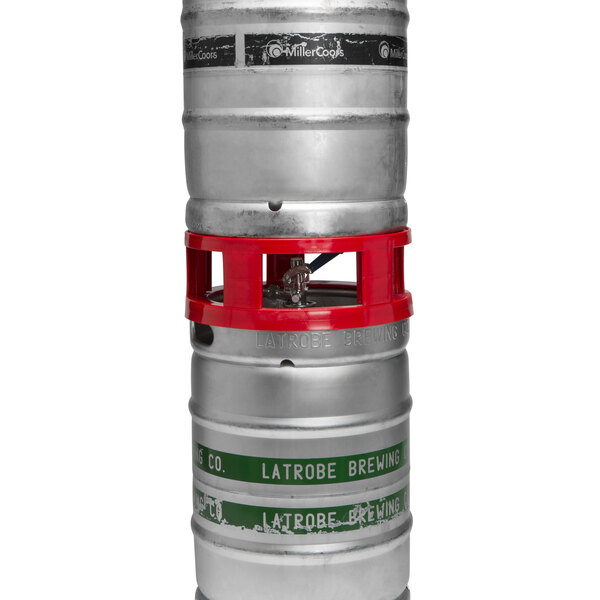 A DeVault keg spacer on a table with kegs with red handles.