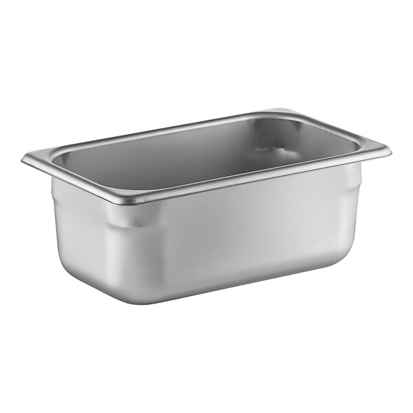 A Vollrath stainless steel hotel pan with a lid.