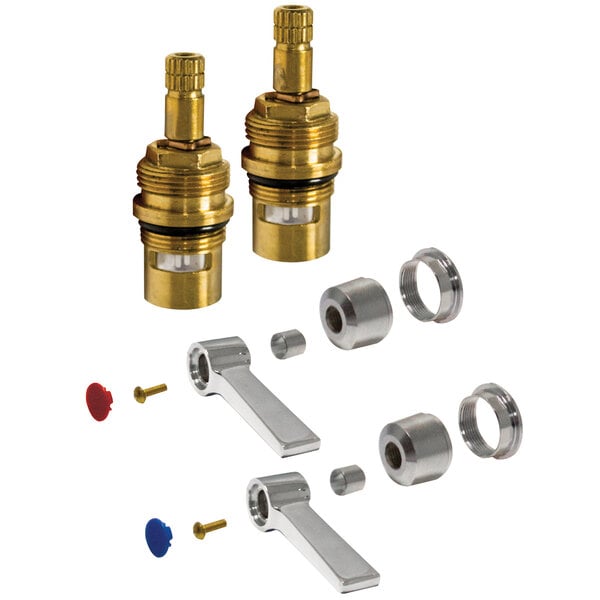 A close-up of two Advance Tabco brass faucet cartridges with black and brass connectors.