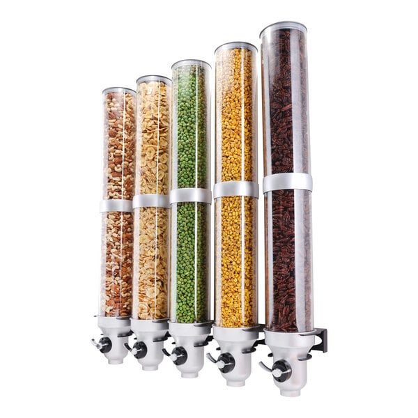 A group of different types of cereals in Cal-Mil wall mount cereal dispensers.